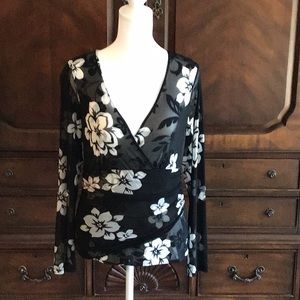 INC crossover style. Gauzy, stretch, form fitting fabric.
